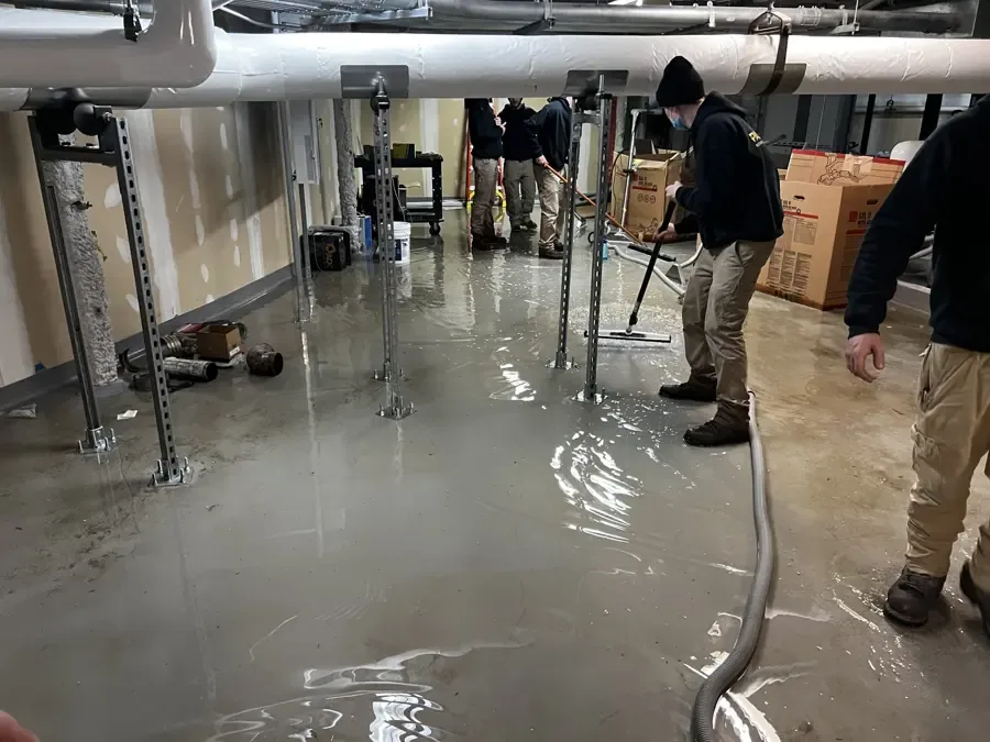 Water spread across the floor of a commercial building